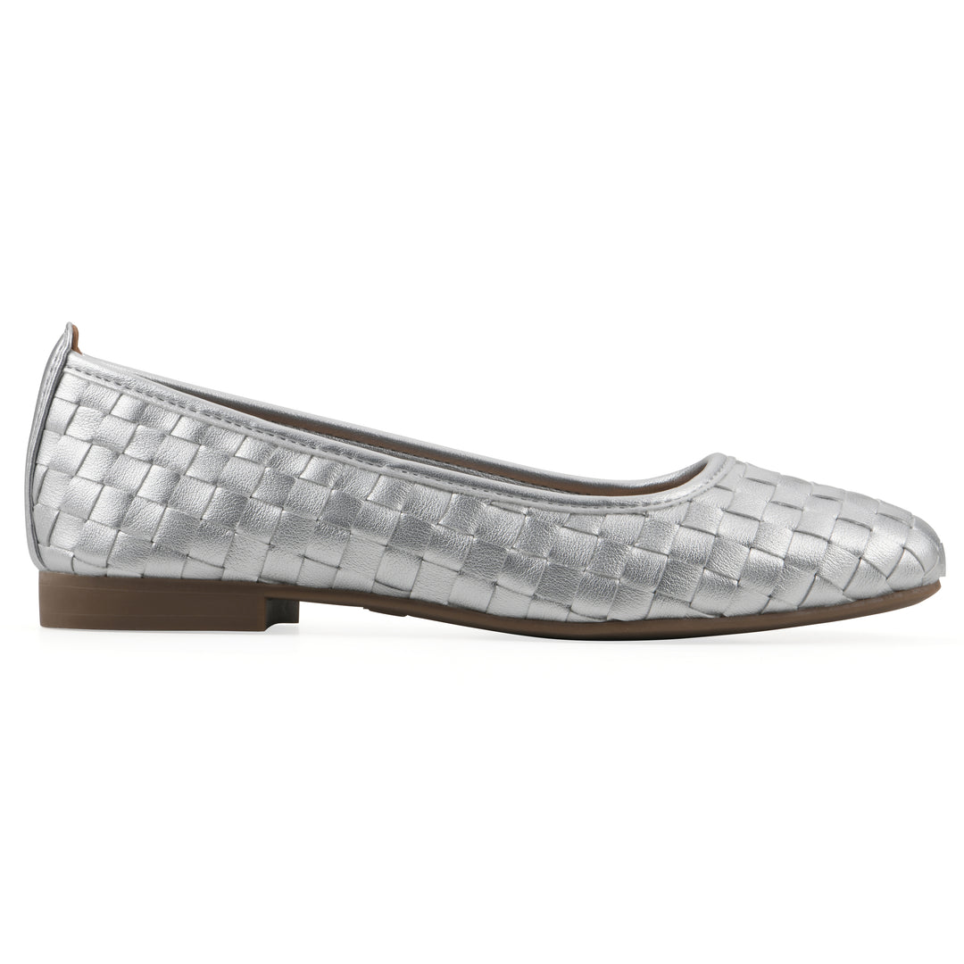 Side view of a quilted style silver flat with low brown sole
