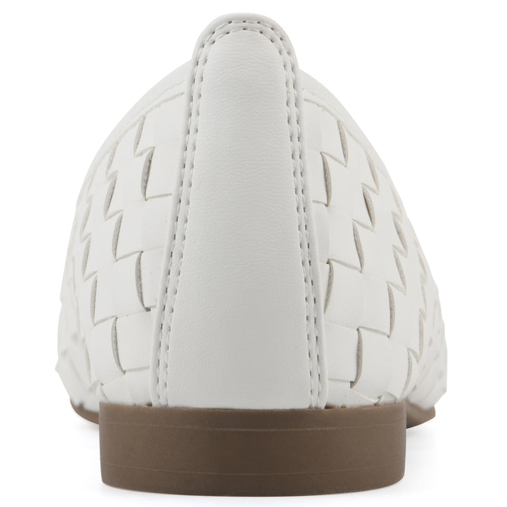 Rear view of a quilted style white flat with low brown sole