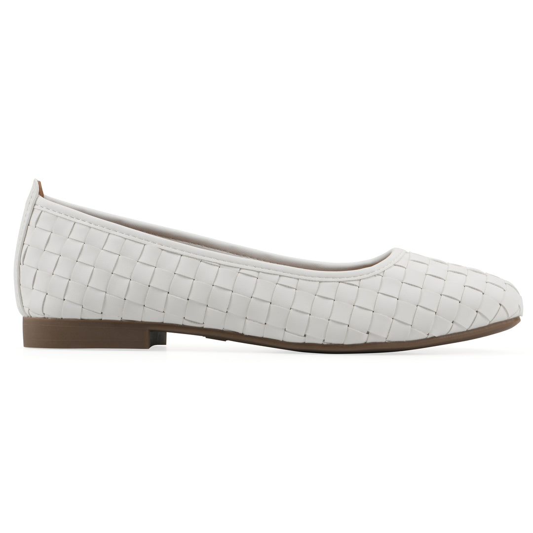 Side view of a quilted style white flat with low brown sole