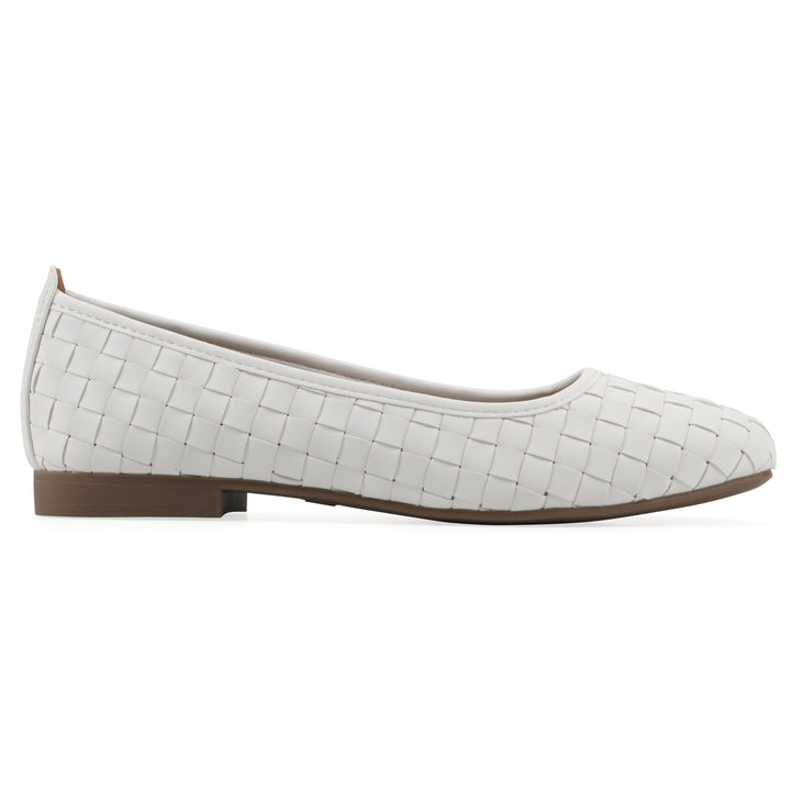 Side view of a quilted style white flat with low brown sole