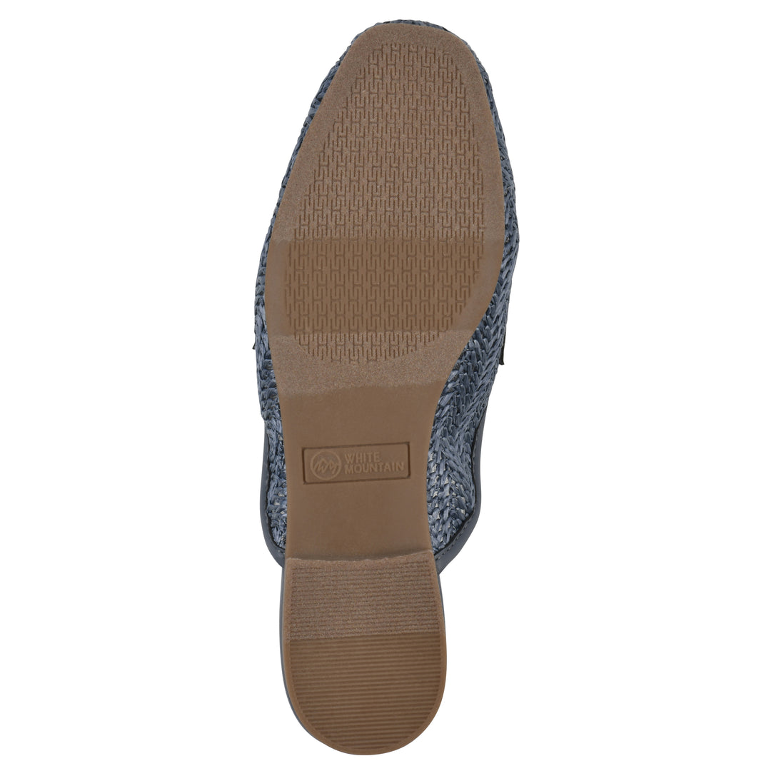Sole view of a blue raffia mule with horizontal metal embellishment and a black 1/2-inch heel