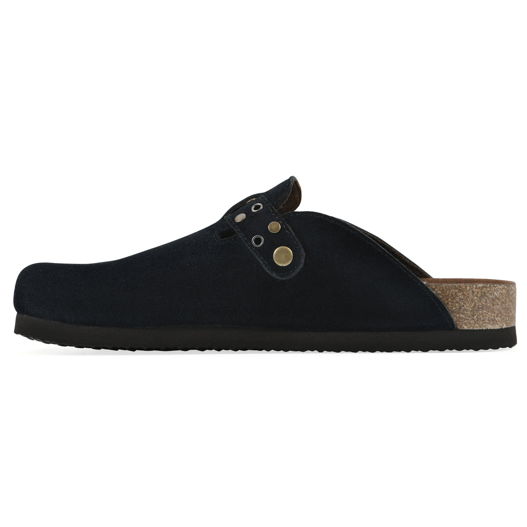 Side view of a black suede backless clog with an adjustable buckle strap with stud and eyelet detailing and a black sole