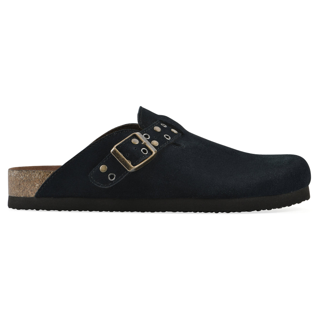 Side view of a black suede backless clog with an adjustable buckle strap with stud and eyelet detailing and a black sole
