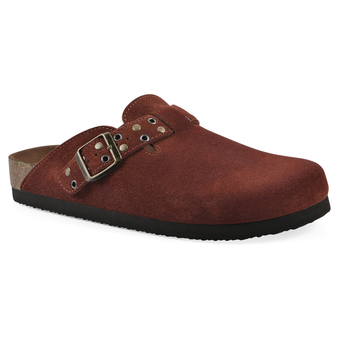 Angle view of a rust suede backless clog with an adjustable buckle strap with stud and eyelet detailing and a black sole