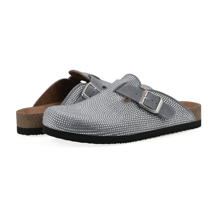 Angle view of a pair of pale blue micro-sequined backless clogs with adjustable buckle strap and black sole