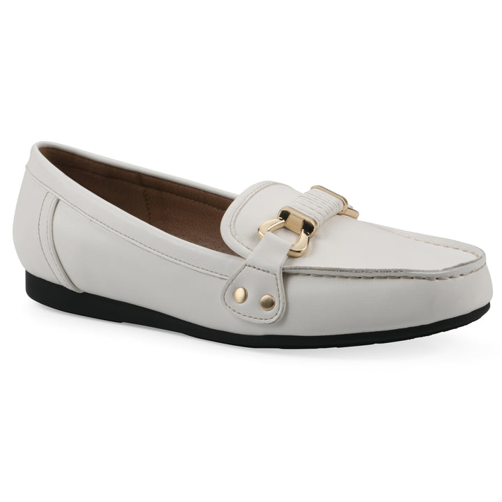 White loafer shoe with gold buckle on a white background