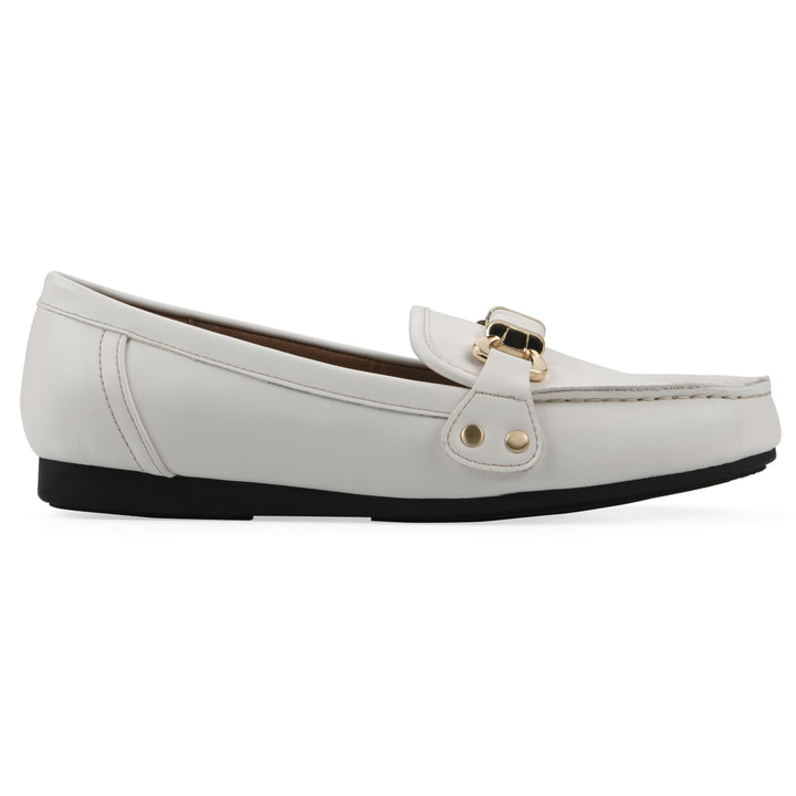 White loafer shoe with a gold buckle on a white background