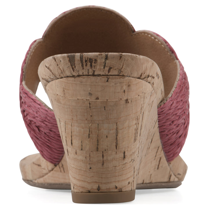 Rear view of a cork print wedge sandal with red raffia thong design