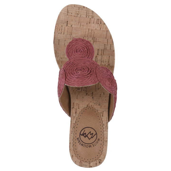 Top view of a cork print wedge sandal with red raffia thong design
