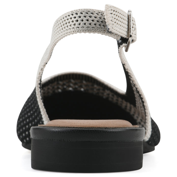 Rear view of a black and white fly-knit slingback with low black heel