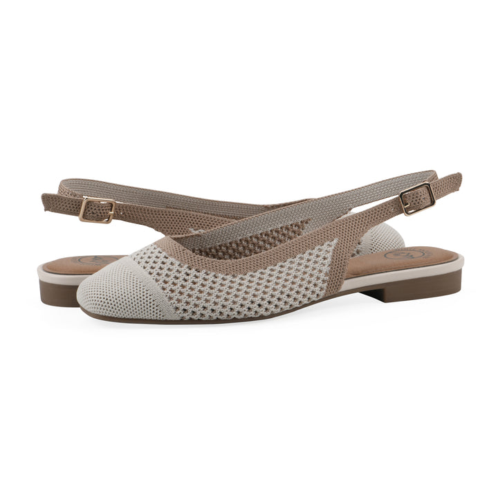 Angle view of a pair of cream and tan fly-knit slingbacks with low light brown heel