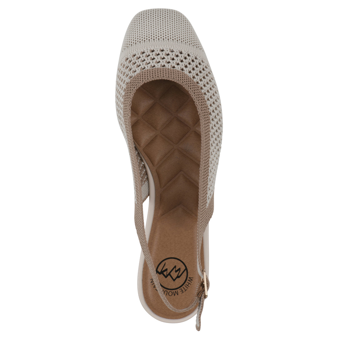 Top view of a cream and tan fly-knit slingback with low light brown heel