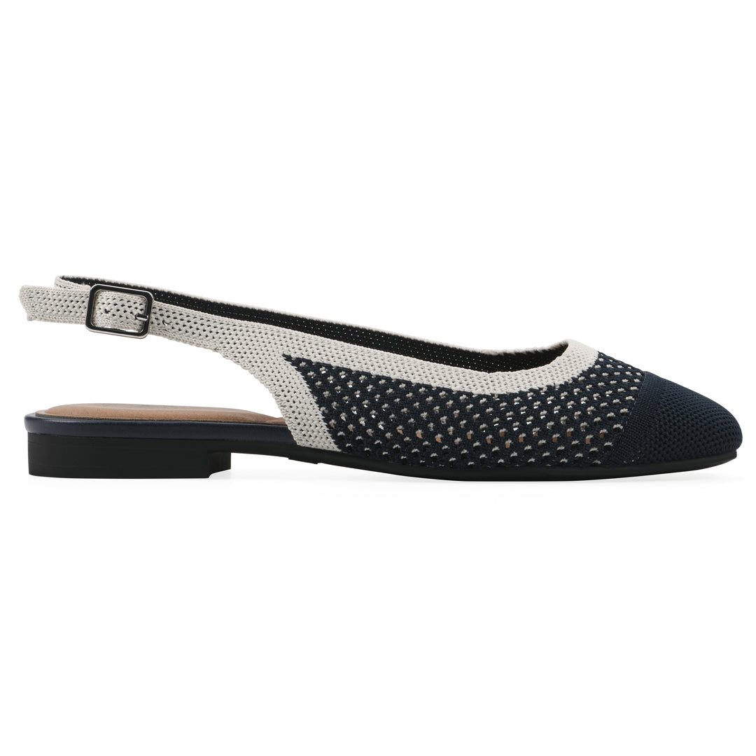 Side view of a white and navy fly-knit slingback with low black heel
