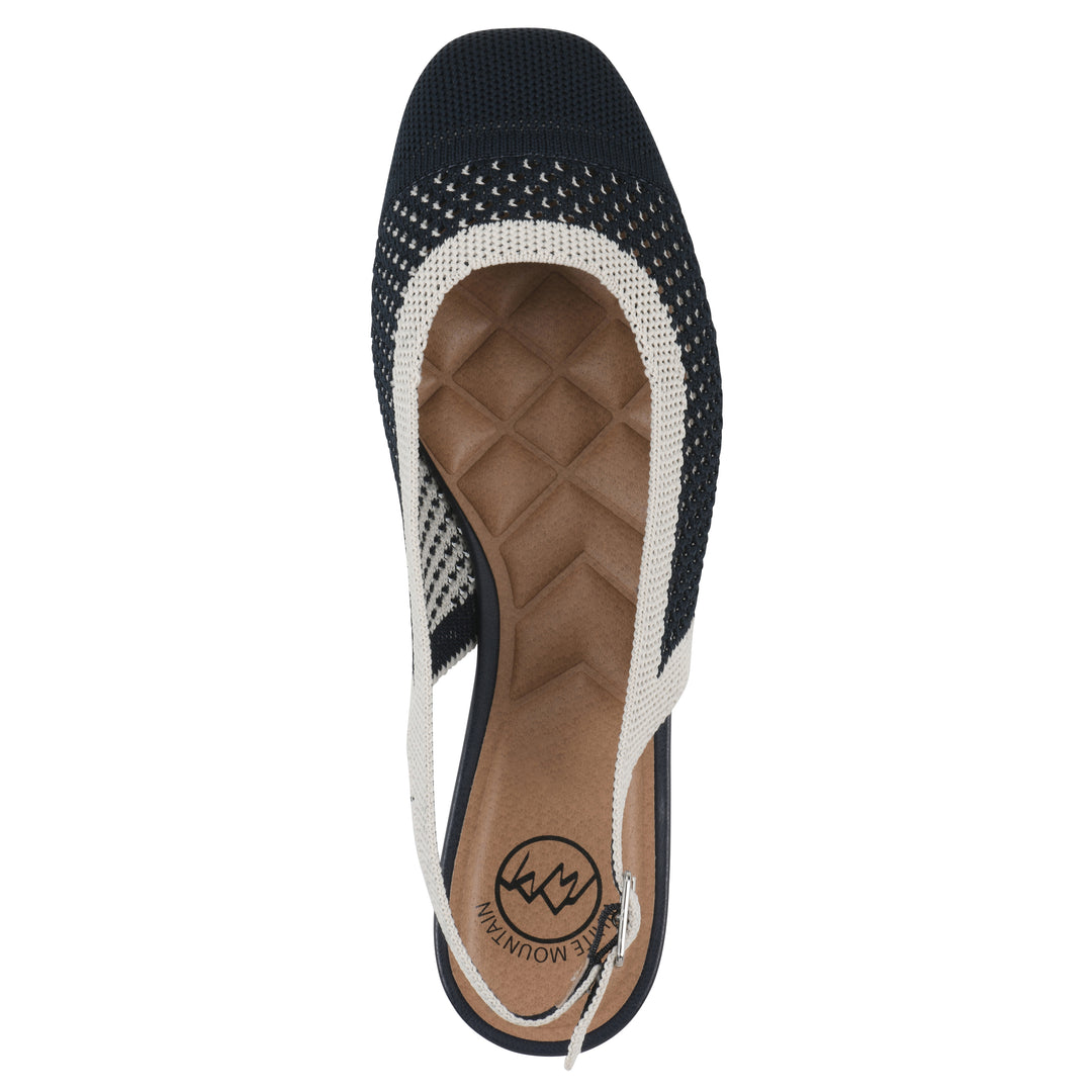 Top view of a white and navy fly-knit slingback with low black heel