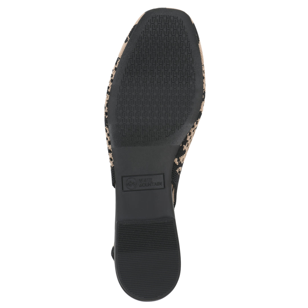 Sole view of a leopard print fly-knit slingback with low black heel