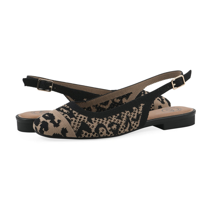 Angle view of a pair of leopard print fly-knit slingbacks with low black heel