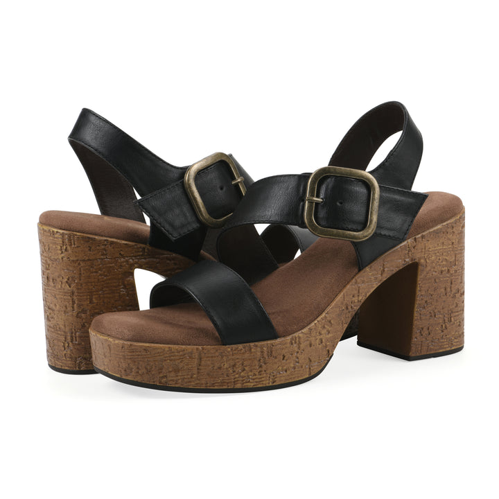Angle view of a pair of black platform sandals with ankle buckle and a brown, faux cork sole