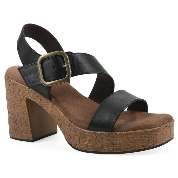Angle view of a black platform sandal with ankle buckle and a brown, faux cork sole