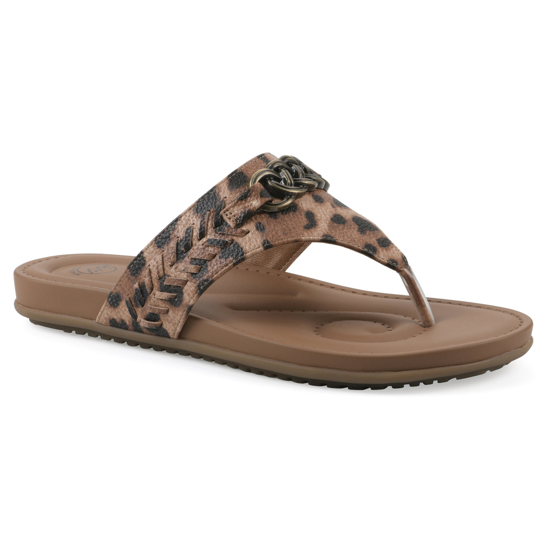 Angle view of a leopard print thong sandal with metal embellishment and a brown sole