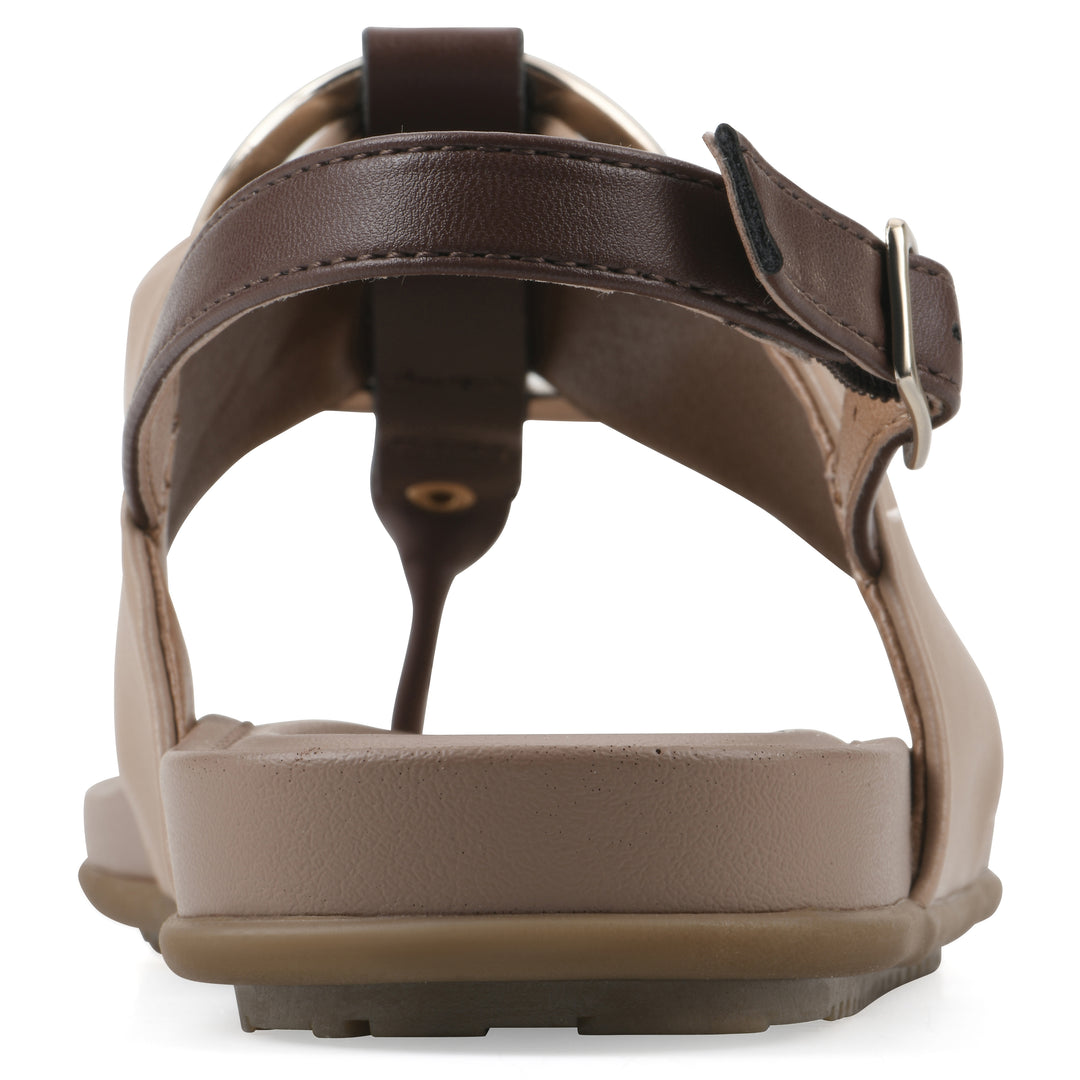 Rear view of a tan thong sandal with a centered metallic ring, adjustable heel strap, and beige sole