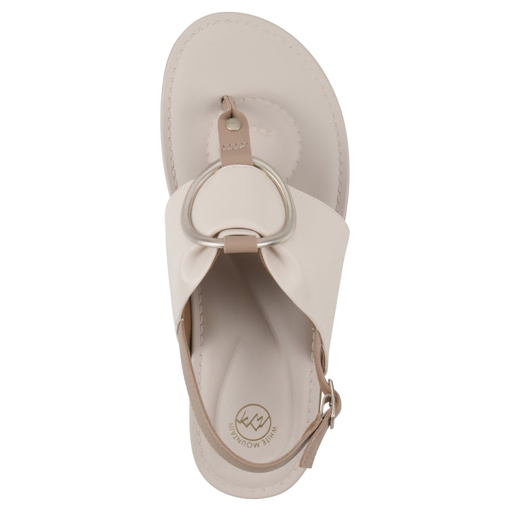 Top view of a cream thong sandal with a centered metallic ring, adjustable heel strap, and beige sole