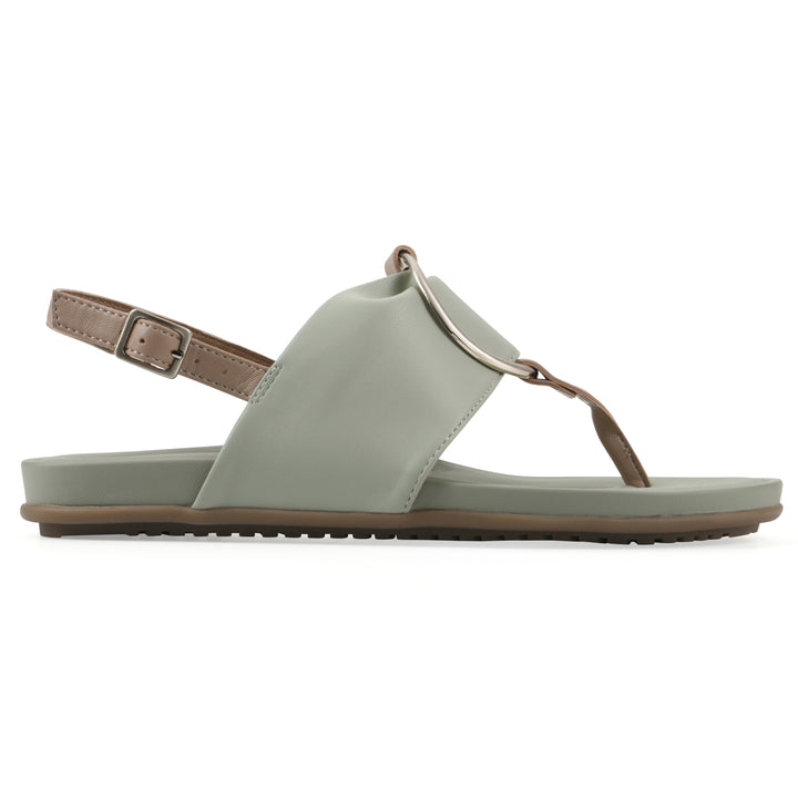Side view of a sage thong sandal with a centered metallic ring, adjustable heel strap, and beige sole