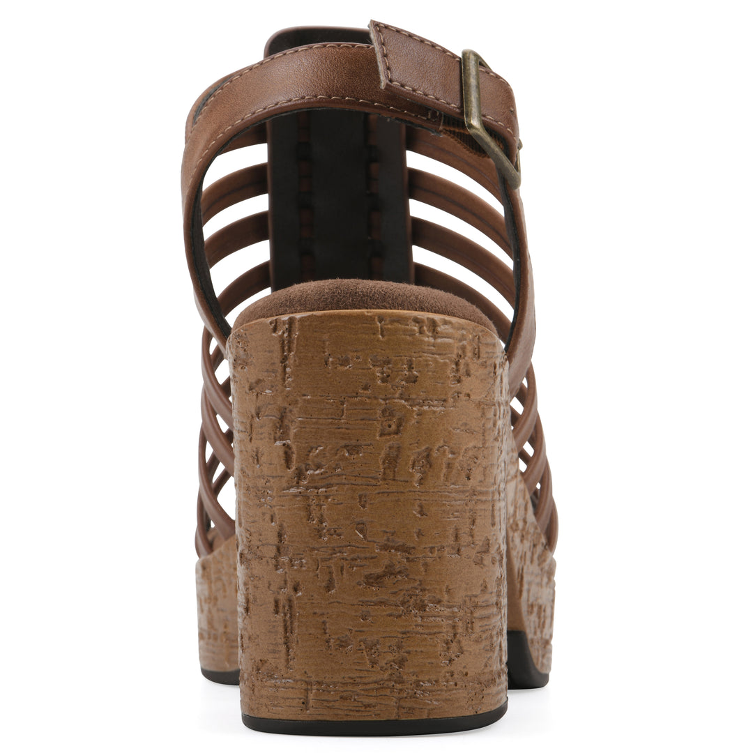 Rear view of a brown gladiator platform sandal with adjustable ankle buckle and cork style heel
