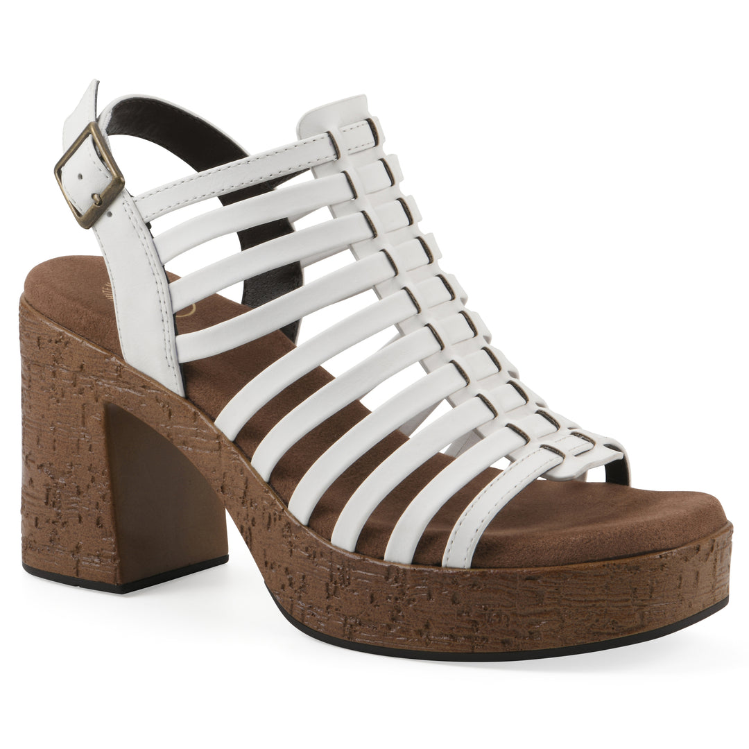 Angle view of a white gladiator platform sandal with adjustable ankle buckle and cork style heel