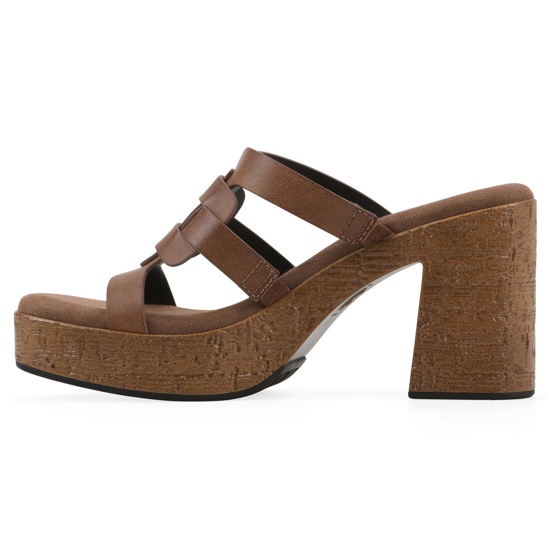 Side view of a brown faux leather platform sandal, with multi-interlaced straps and a brown cork style sole