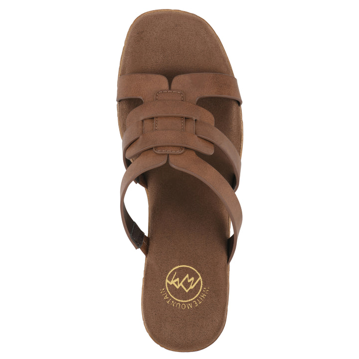 Top view of a brown faux leather platform sandal, with multi-interlaced straps and a brown cork style sole