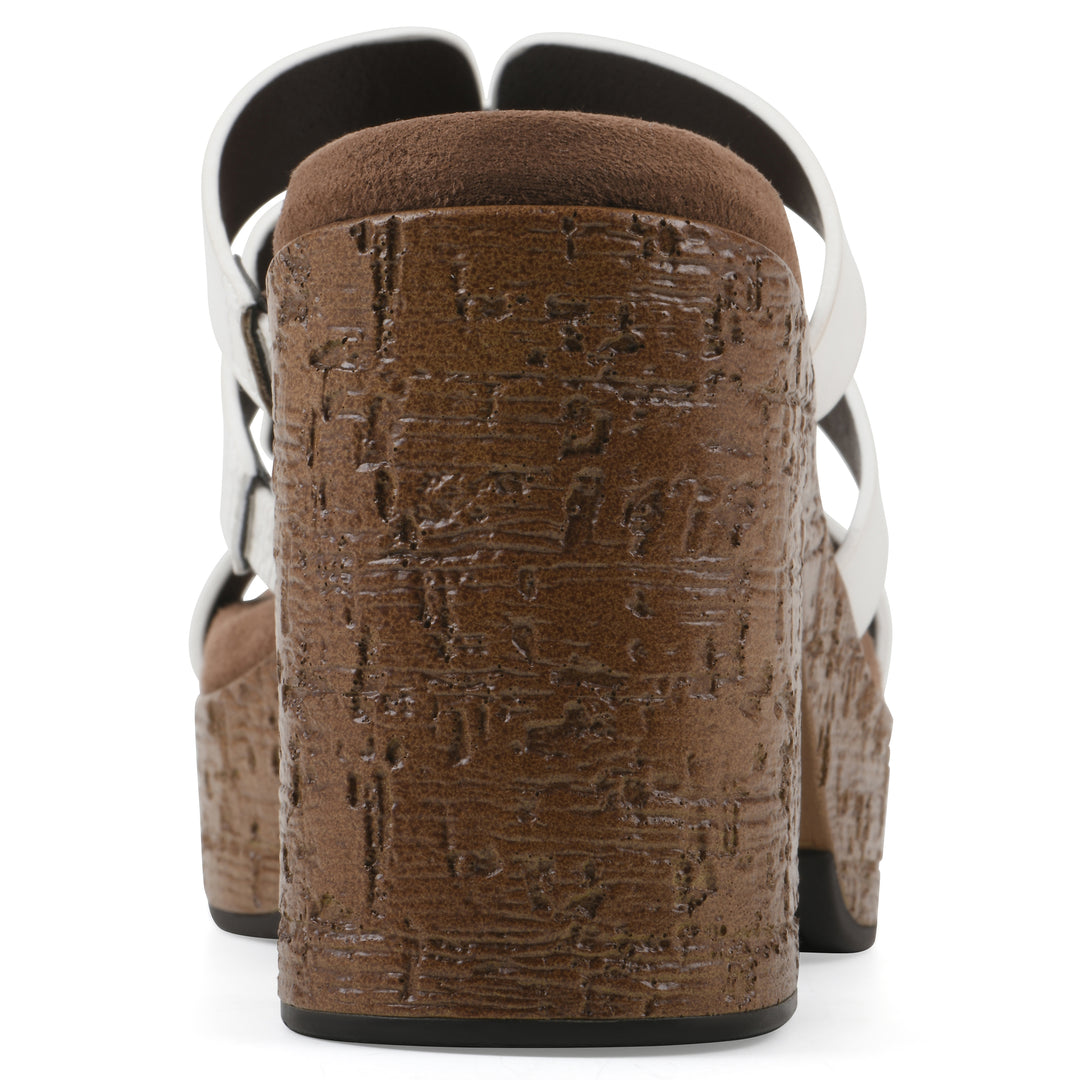 Rear view of a white faux leather platform sandal, with multi-interlaced straps and a brown cork style sole