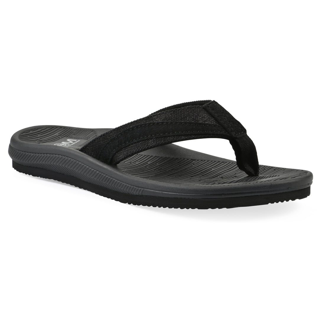 Angle view of a cushioned black fabric thong sandal with black patterned sole